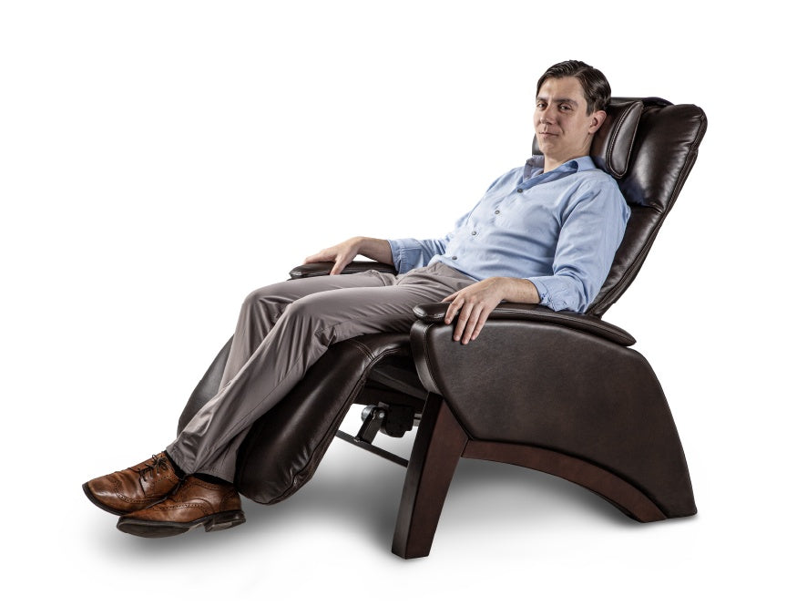 Furniture, Comfort, Sleeve, Knee, Thigh, Chair, Formal wear, Leisure, Human leg, Armrest