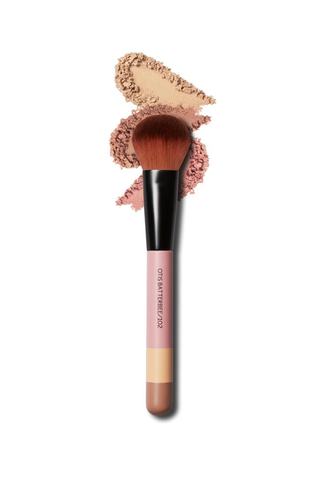 Otis Batterbee Blusher Brush: A finely crafted makeup brush designed for precise and effortless application of blush, adding a natural and radiant finish to your makeup look.