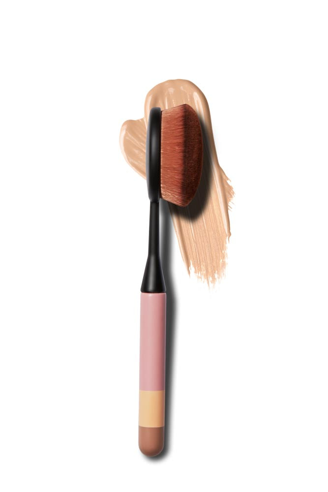 Image: Otis Batterbee Foundation Buffer Makeup Brush: A high-quality makeup brush with densely packed bristles for seamless foundation application.