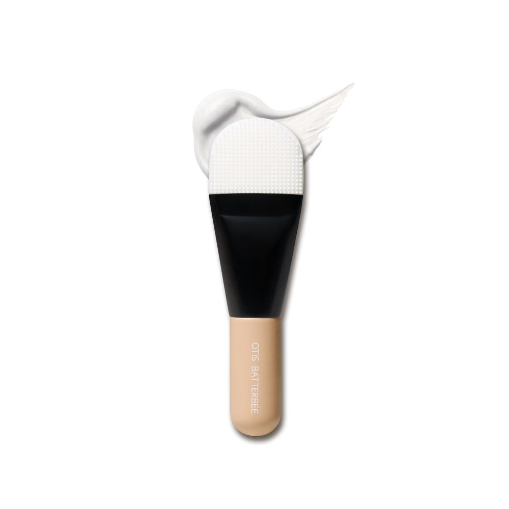 Otis Batterbee Face Cream Applicator: A versatile silicone beauty tool with a smooth side for precise application of face creams and a textured side for gentle removal of face masks. Elevate your skincare routine with this dual-sided applicator, ensuring a luxurious and effective pampering experience for your skin.