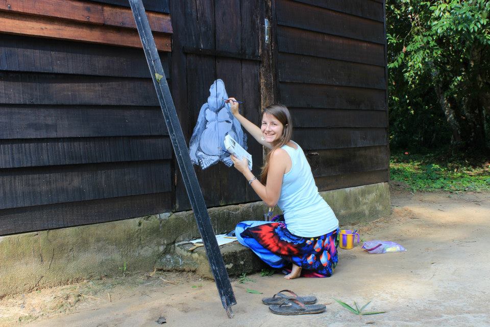 Sarah Cheetham, Twig founder, paiting a blue gorilla in the Congo
