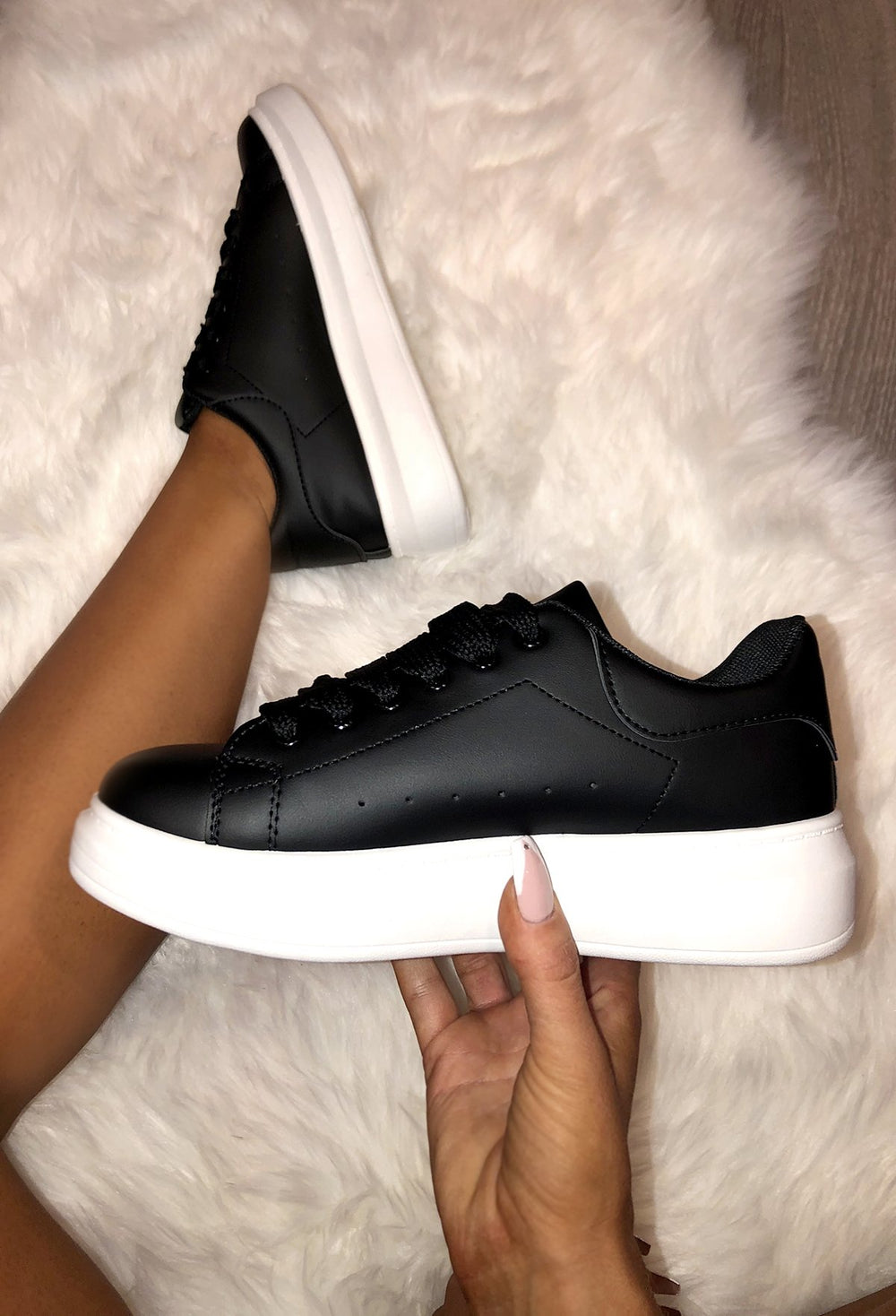 thick sole black trainers