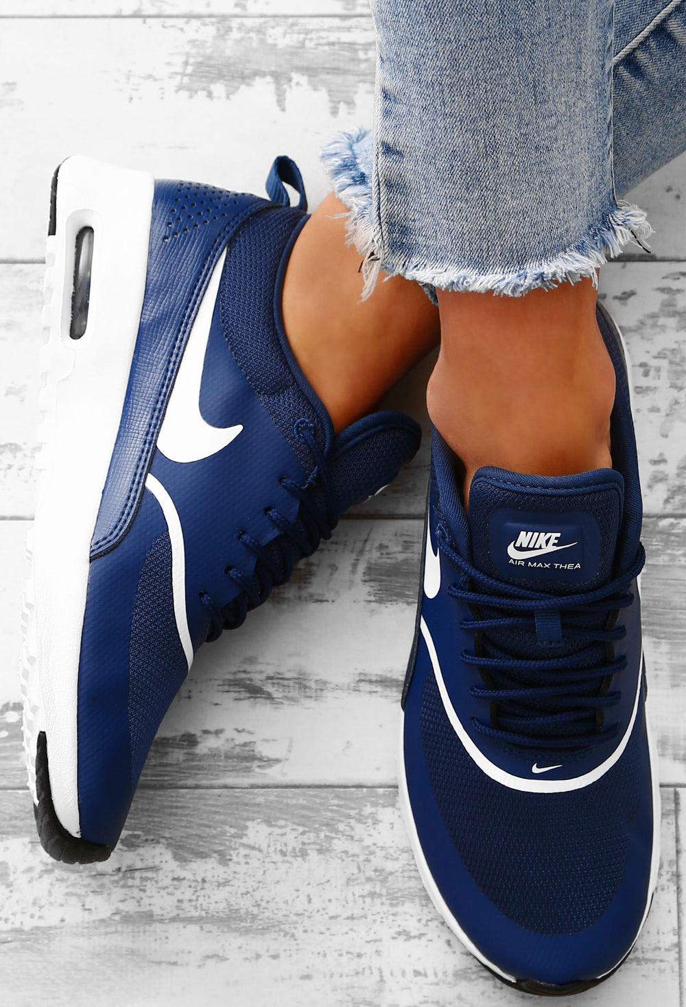 nike navy and pink trainers