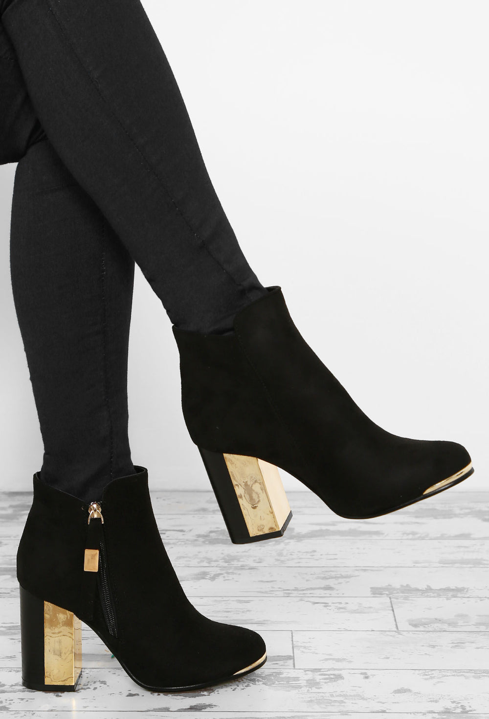 black boots with metallic heel