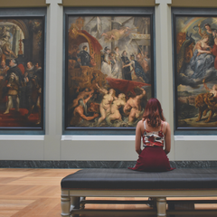 Girl sitting in museum