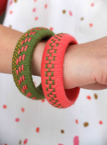 Green and coral bangles made with yarn