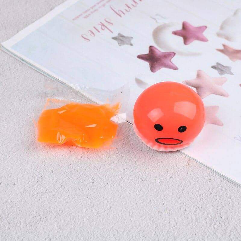 squishy puking egg yolk stress ball