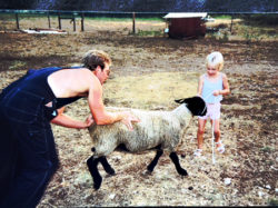 Alana with sheep