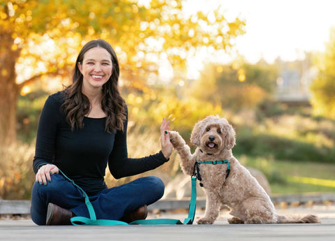 Nicole Ellis and her dog Rossi wearing the Rover Gear Better Walk No Pull Harness