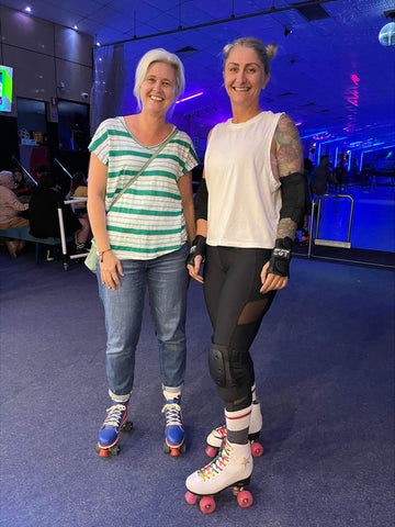 2 friends in roller skates