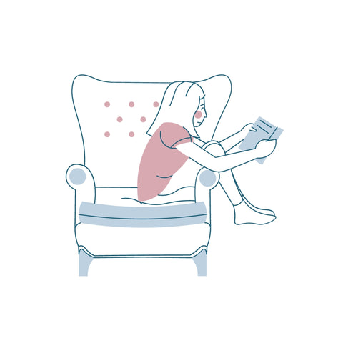 Drawing of a girl sitting on chair reading a book