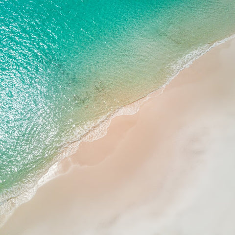 Beautiful green water against sand