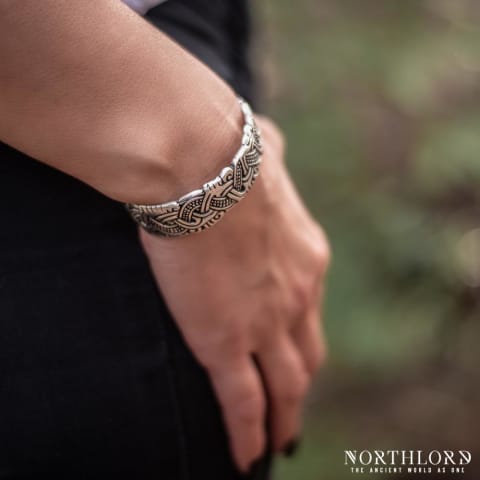 A female model posing while wearing a Viking bracelet inspired by historical artifacts - Northlord (3)