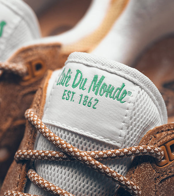 saucony shadow 5000 politics cafe du monde