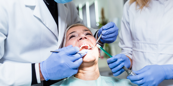 patient with two dentists porcelain veneers