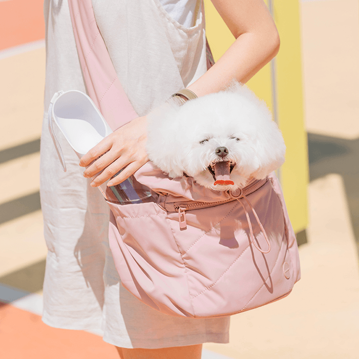 https://cdn.shopify.com/s/files/1/0087/3237/7151/products/snuggle-petite-pet-carrier-dusted-pink-695886.png?v=1677138166