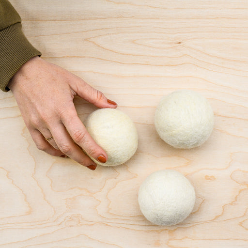 https://cdn.shopify.com/s/files/1/0087/3873/4138/products/wool-dryer-ball_512x512.jpg?v=1615841464