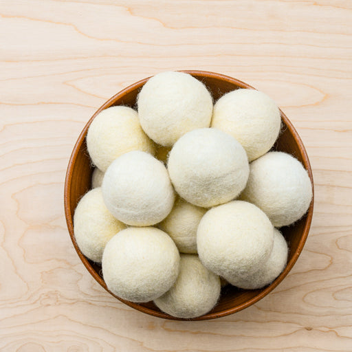 https://cdn.shopify.com/s/files/1/0087/3873/4138/products/wool-dryer-balls_512x512.jpg?v=1615841451