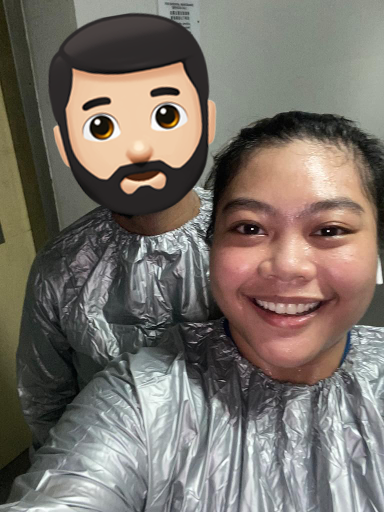 Fah and her husband wearing their sauna suits!