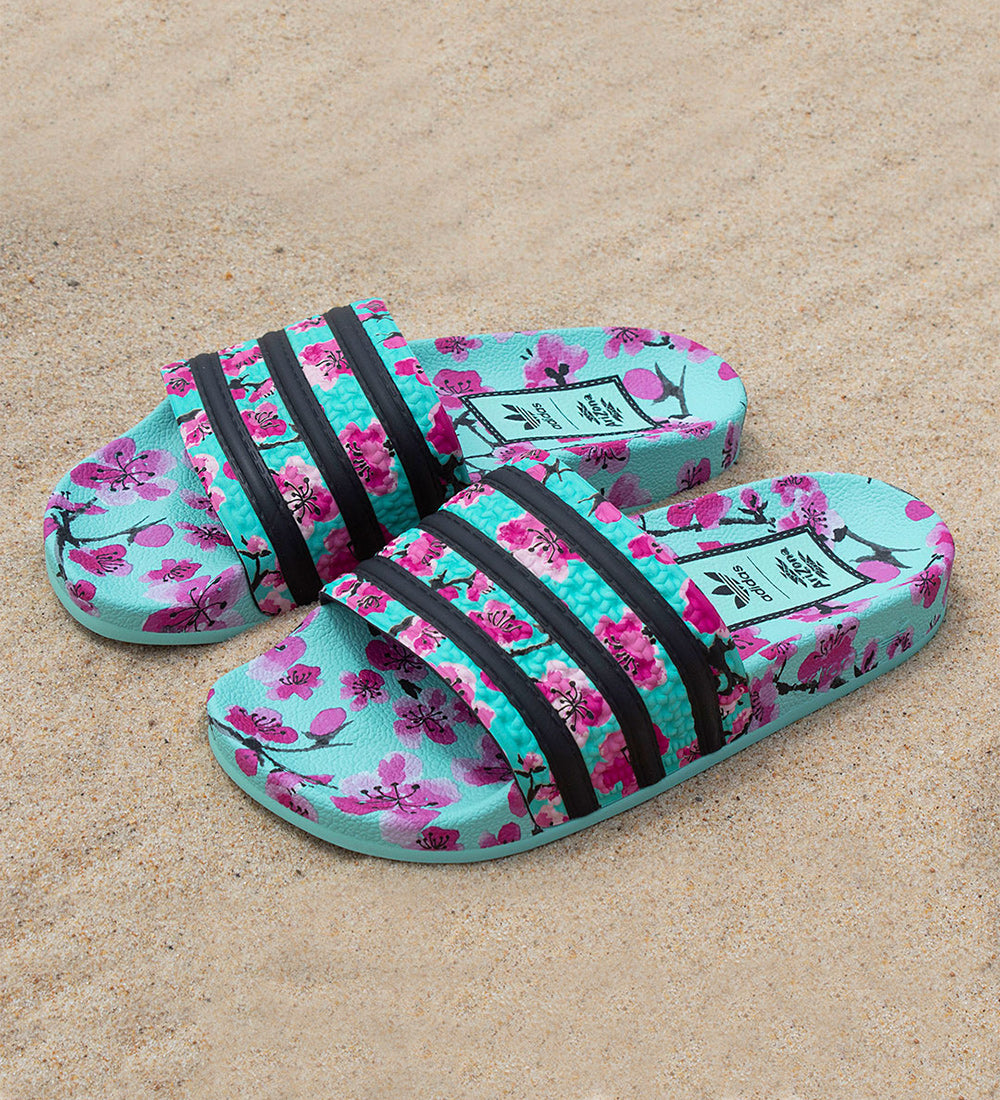 Buy > adidas teal slides > in stock