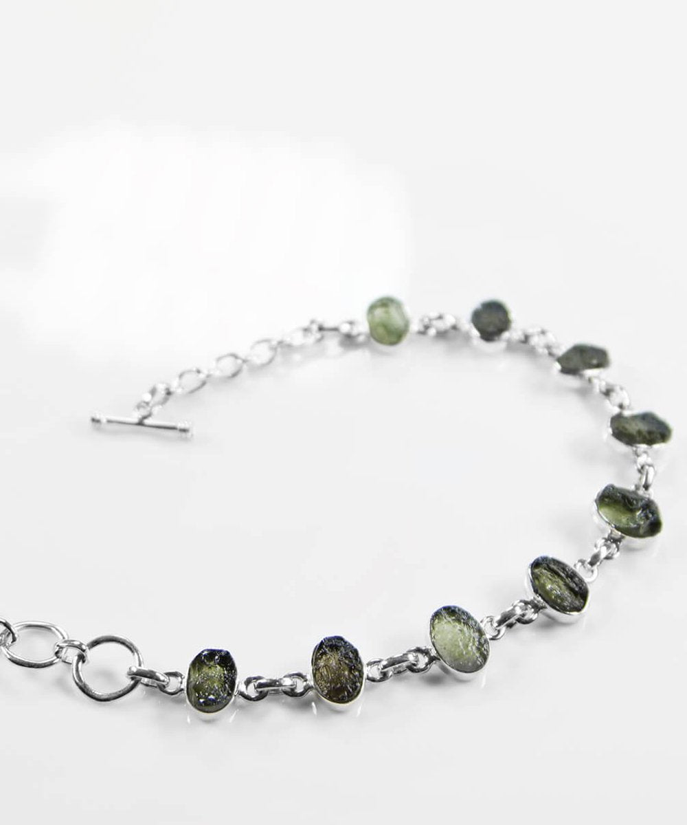 https://www.thefossilstore.com/collections/meteorites/products/moldavite-925-silver-bracelet-250mm