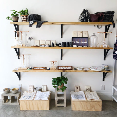 Shop display of shelves featuring locally made, independent products