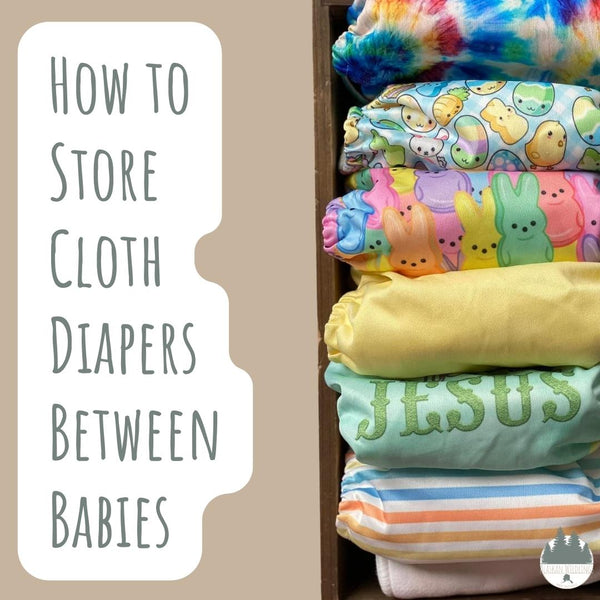 Cloth diapers in a basket with the text, "How to Store Cloth Diapers Between Babies."