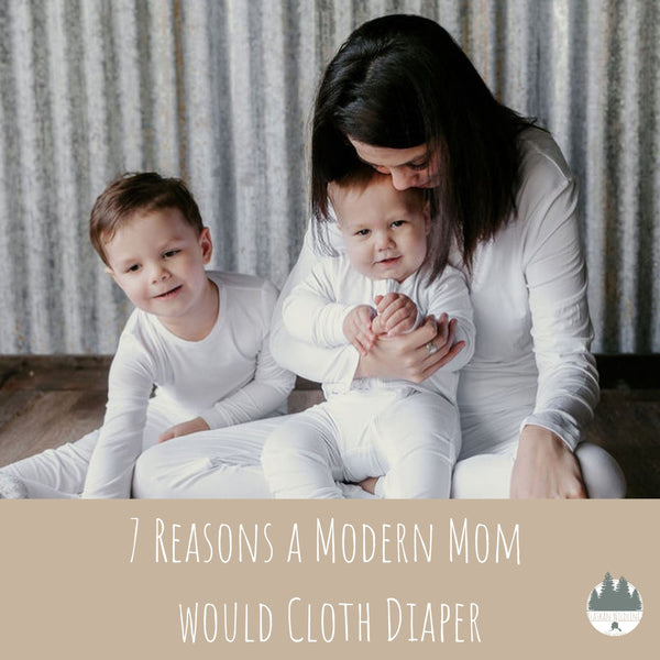 Mom and two kids in white bamboo jammies cuddling. It reads "7 Reasons a Modern Woman would Cloth Diaper."