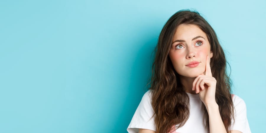 Young girl in white tee pondering questions on her mind | Pakapalooza