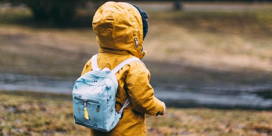 Young Child Travelling with Backpack | Pakapalooza