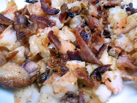 Chopped shrimp and bacon, ready to be added to the risotto