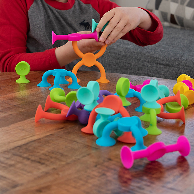 Fat Brain Toys Squigz 2.0 - 36 Piece Set Boy Playing