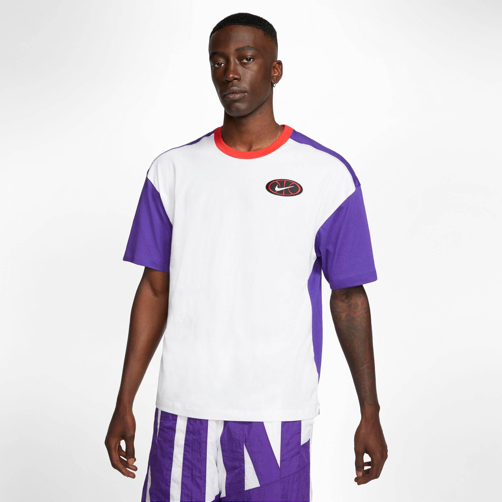 red and purple nike shirt