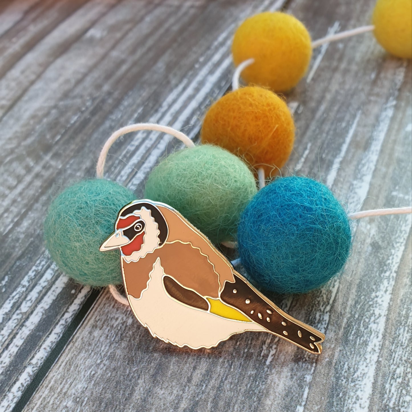 Goldfinch hard enamel brooch