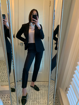 Black blazer styled for business casual