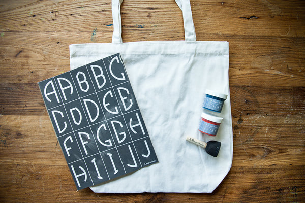 Want to craft your own DIY monogrammed tote bag? Follow these simple steps for using A Makers’ Studio easy monogram stencils to create a DIY tote that is custom to you.