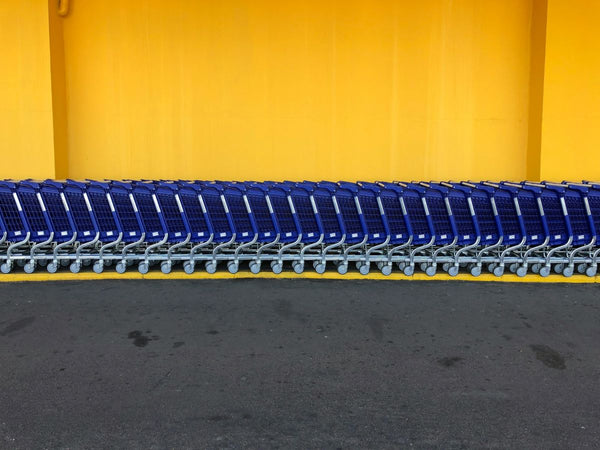 Durable plastic tool cart in a warehouse setting