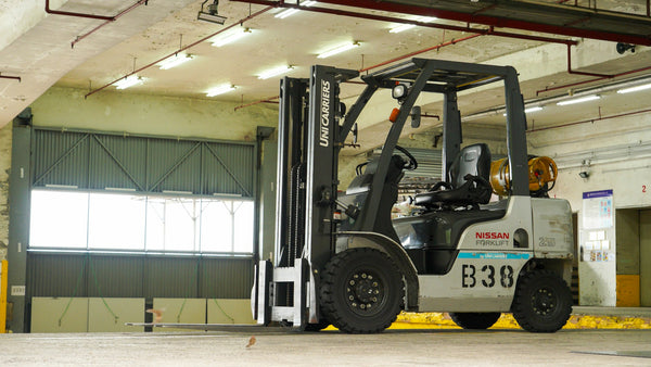 Forklift in action inside warehouse