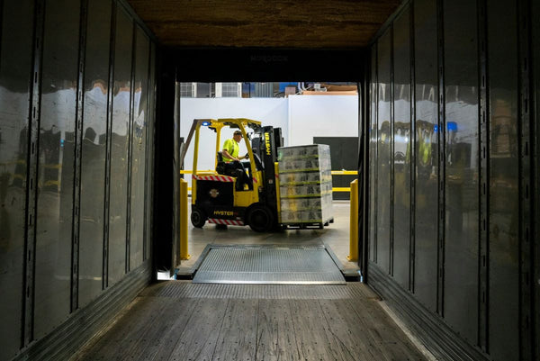 Forklift operating efficiently in a warehouse