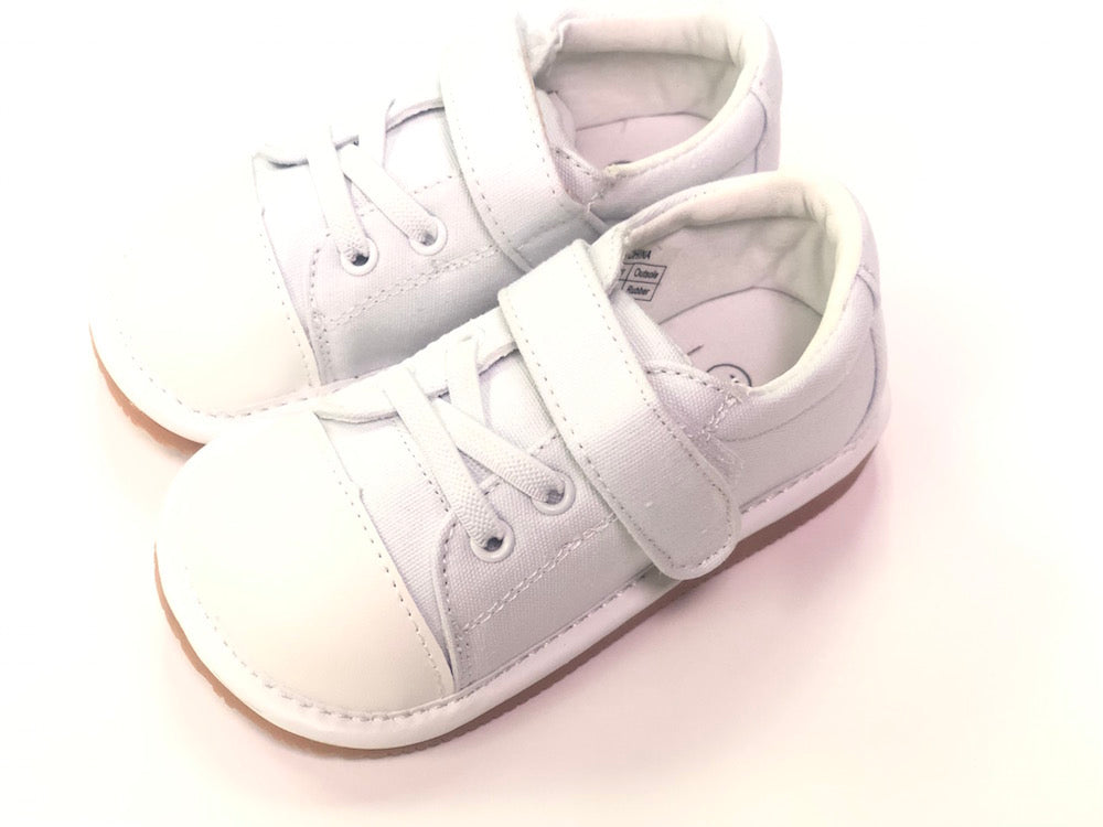little girl white canvas tennis shoes