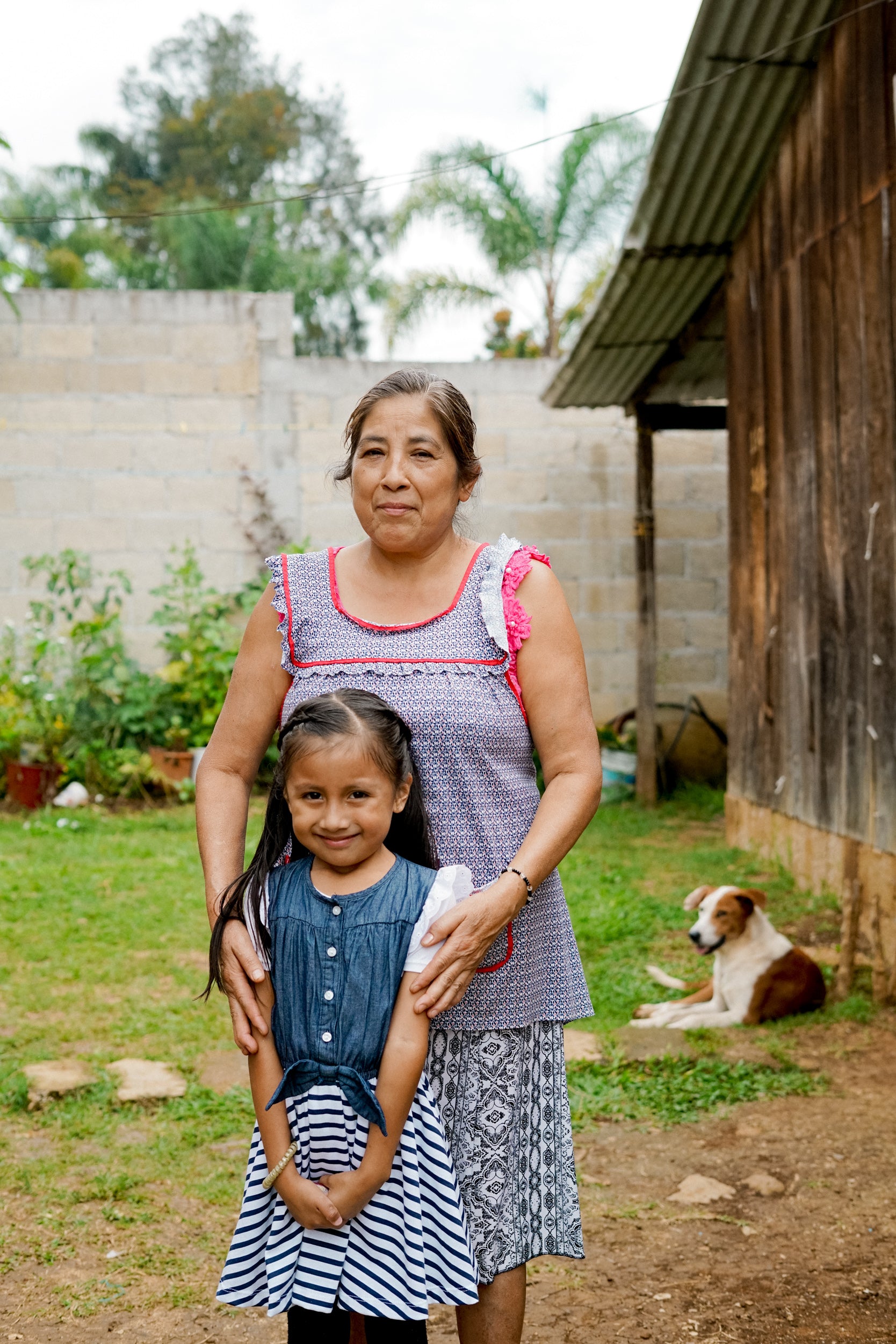 Woman smiling with her daughter, coffee farming mexico