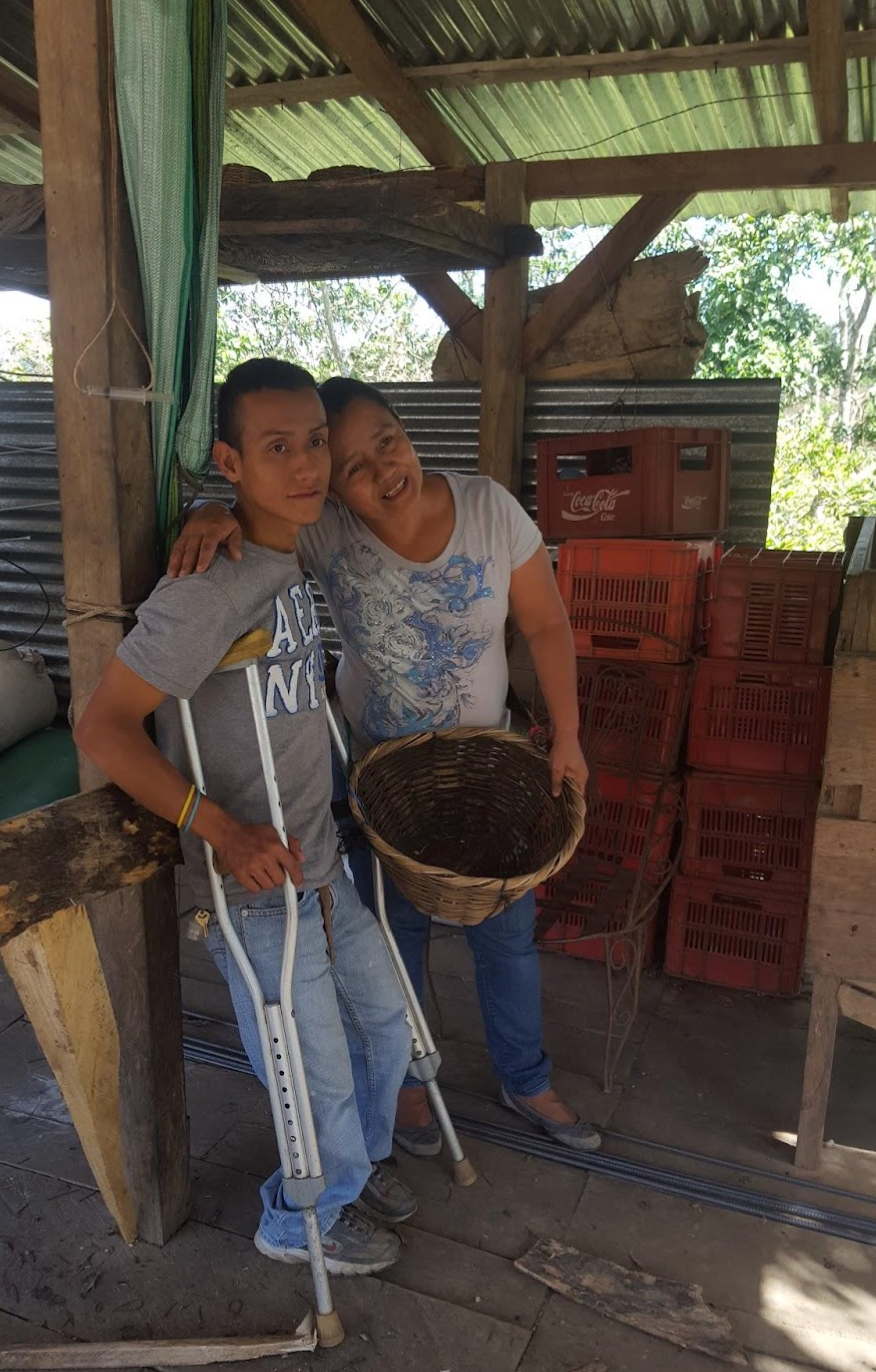 Woman Coffee Farmer with Son 