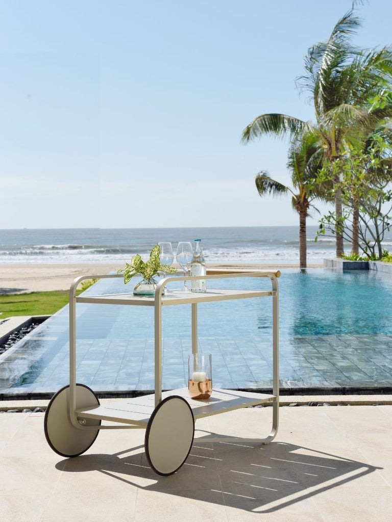 Tea trolly with drinks next to the swimming pool