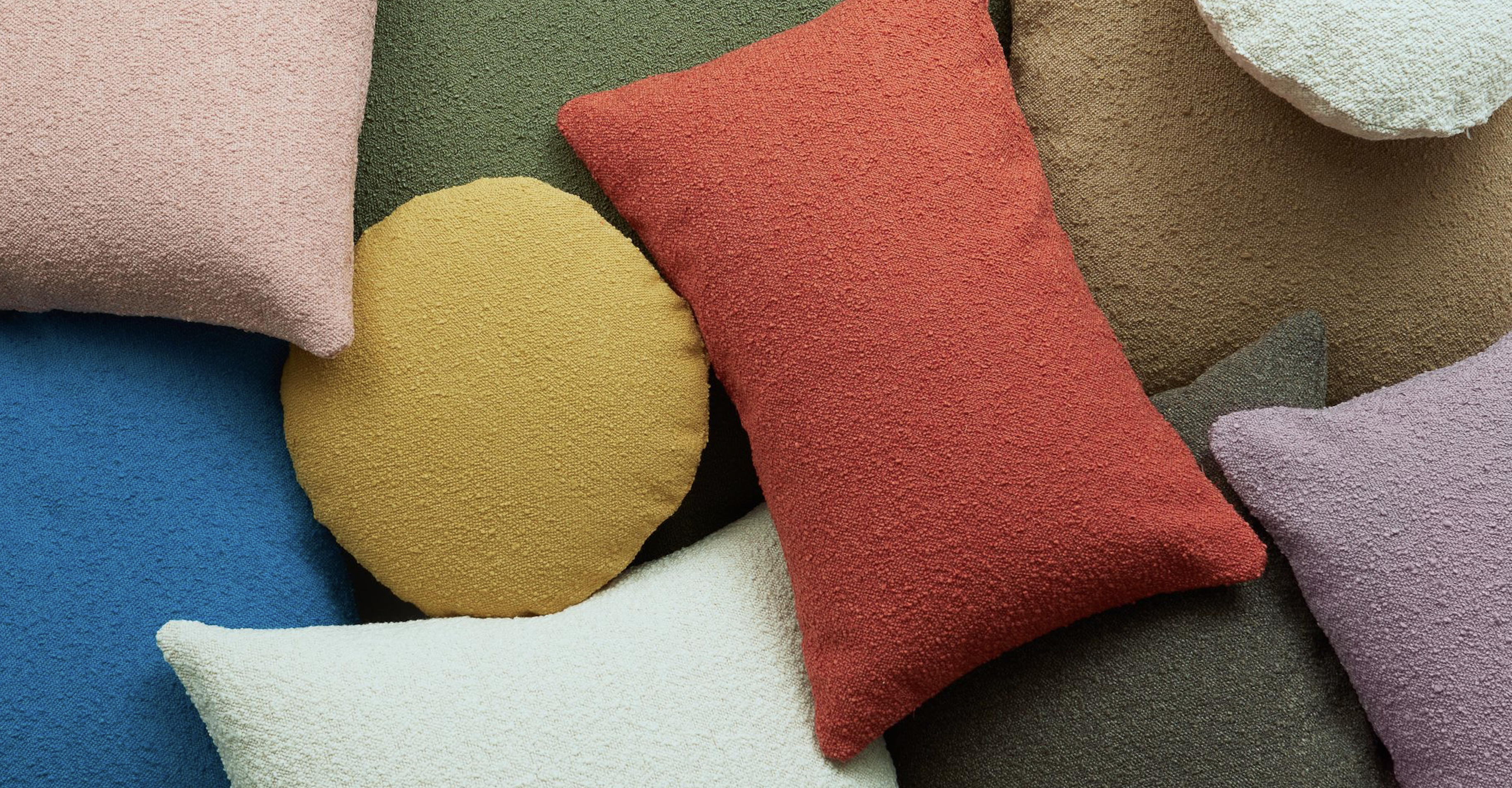 An assortment of colourful Hommey cushions