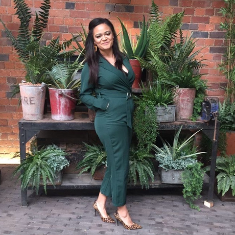 Women Pants Suit In Front Of Plants