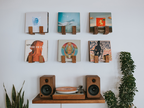 Record wall featuring Walnut Flip Record Display Shelves