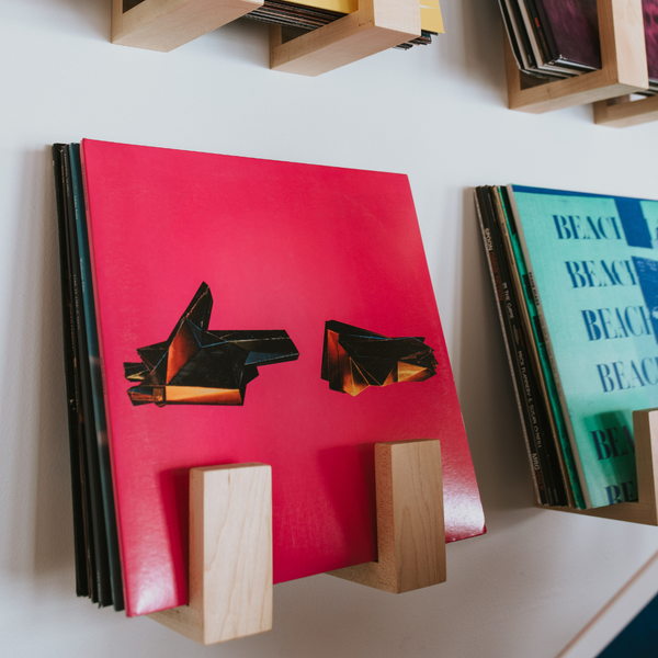 RTJ 4 in some maple Flip Record Display shelves on the wall