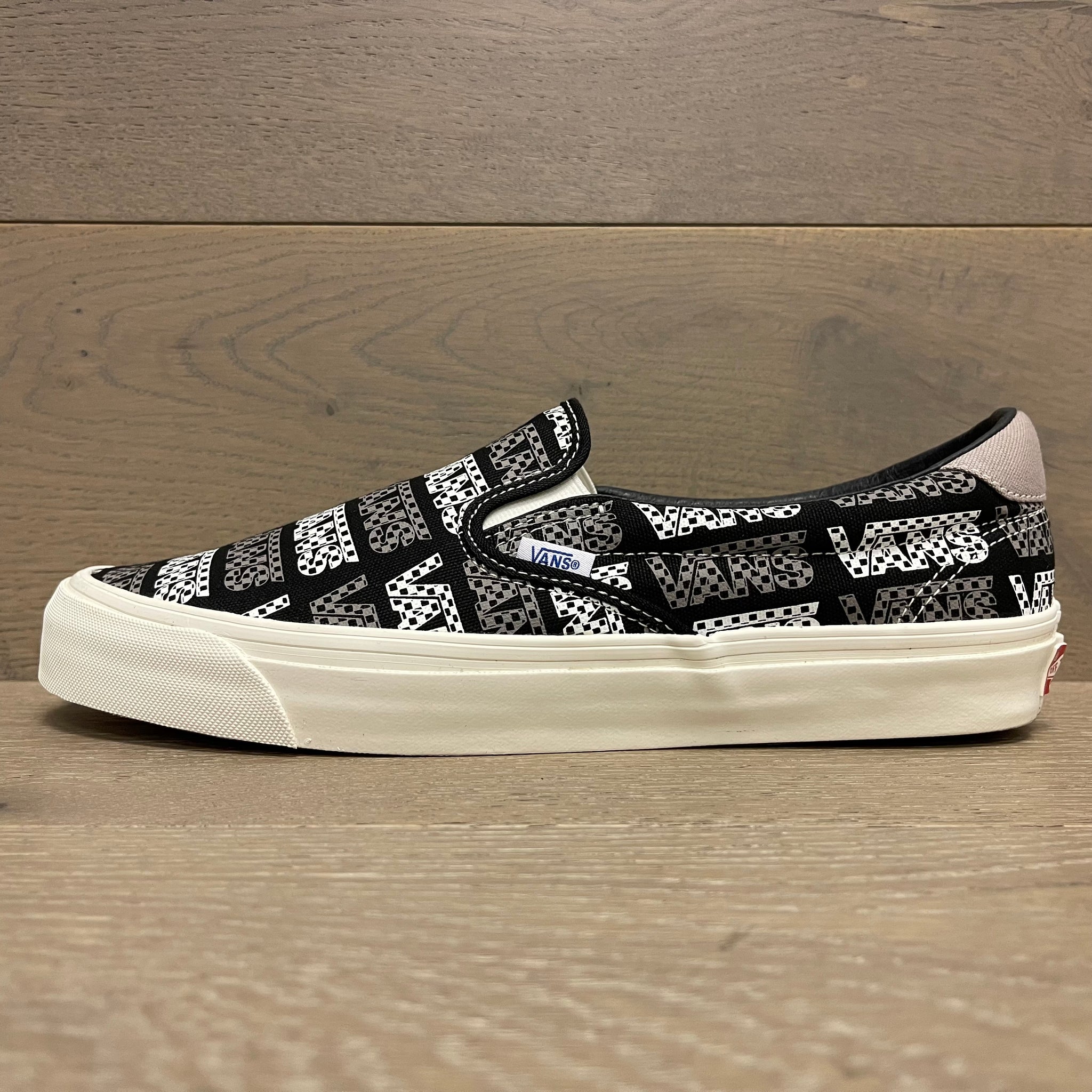 OG SLIP-ON 59 LX CANVAS (BLACK/LOGO CHECKERBOARD) – SneakersLife.com