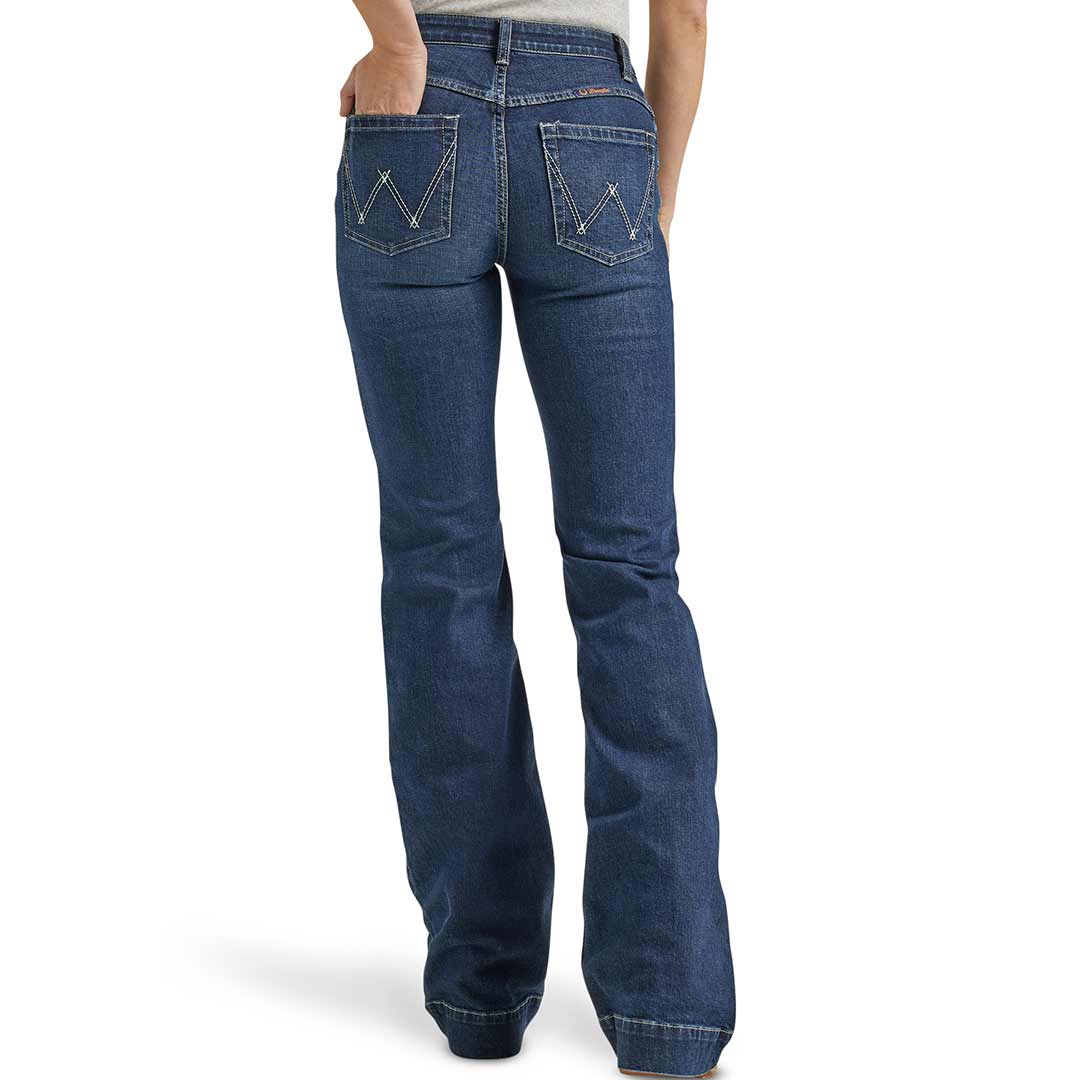 https://cdn.shopify.com/s/files/1/0088/6944/5690/files/wrangler-women-s-ultimate-riding-willow-mid-rise-trouser-jeans.jpg?v=1700671899