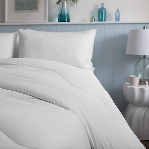 Our Smart Temperature pillow and duvet in white. Temperature control bedding for you're too hot to sleep. 